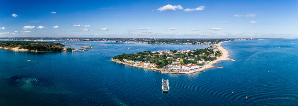 Aerial view of Poole coastline with deep blue sea on a clear day
