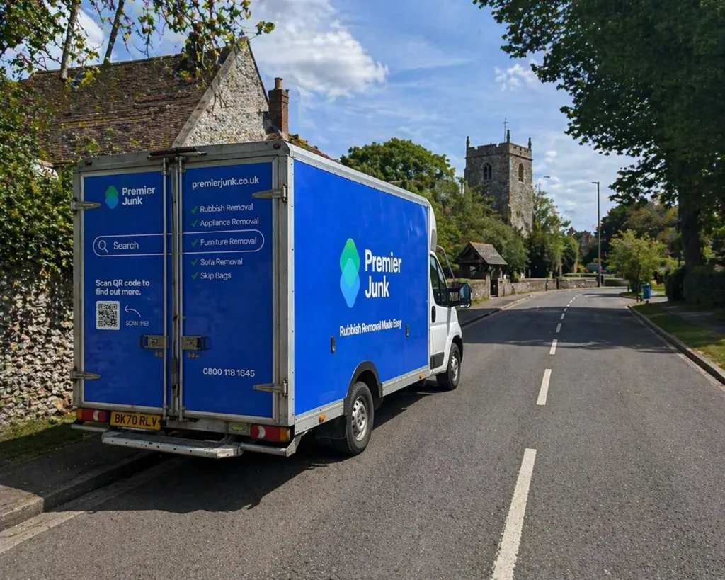 Premier Junk van driving through Durrington
