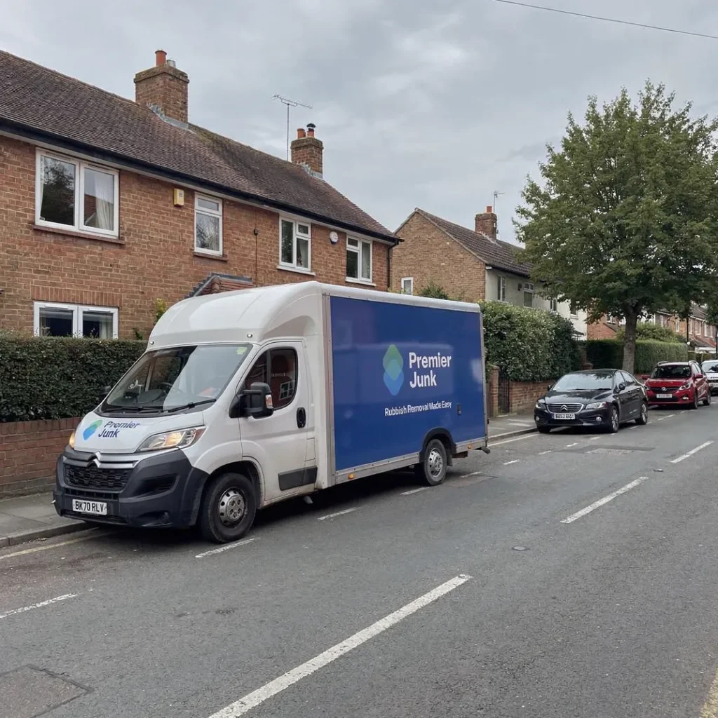 Premier junk van parked on street in Southbourne